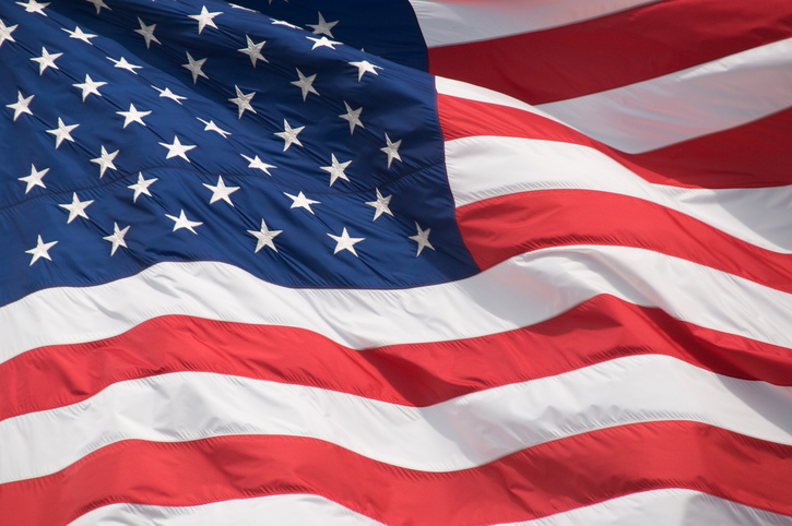 close up of American flag blowing in the wind